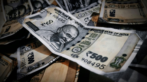 Indian rupee,USD to INR exchange rate,currency depreciation,inflation,fiscal deficit,current account deficit,US dollar strength,geopolitical tensions,global economic slowdown,Reserve Bank of India,RBI interventions,economic growth,financial report,currency market